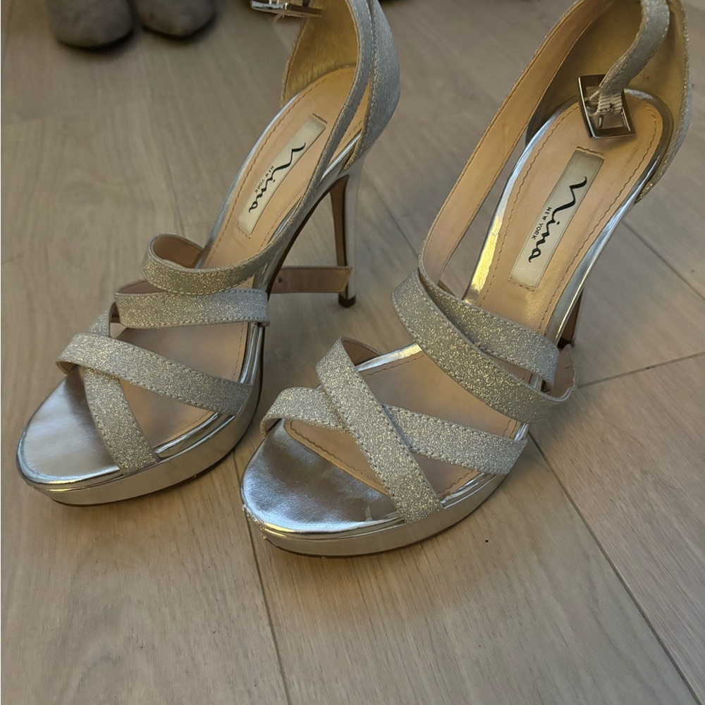 Silver platform heeled shoes worn once